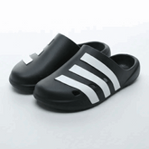 Black slides with white stripes on a white background