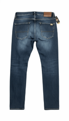 Blue jeans with a visible brand tag on a white background