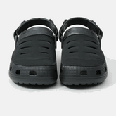 Black clogs on a white background