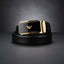Black belt with gold buckle on a dark background