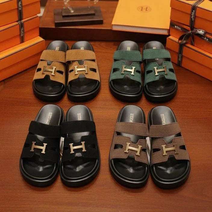 Set of four sandals in different colors with 'H' logo on a wooden surface, surrounded by orange boxes.