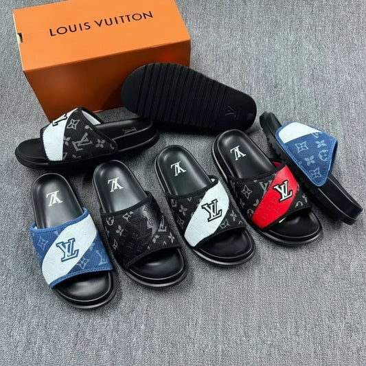 Louis Vuitton slides with various color combinations on a gray surface.