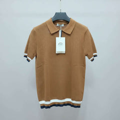Brown knitted polo shirt with a tag on a hanger in a store setting