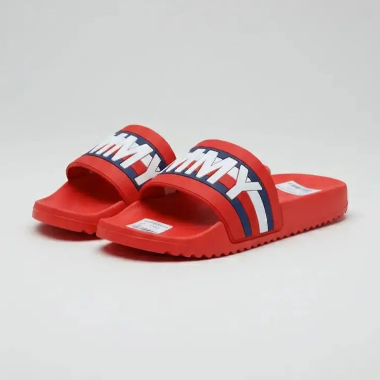 Red slides with a brand logo on a light gray background