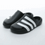 Black slides with white stripes on a white background