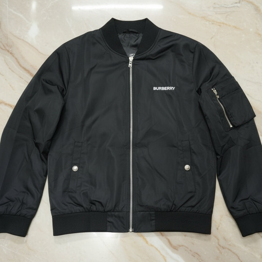 Black Burberry jacket on a light marble surface Main image