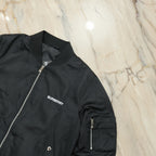 Black Burberry jacket on a marble surface