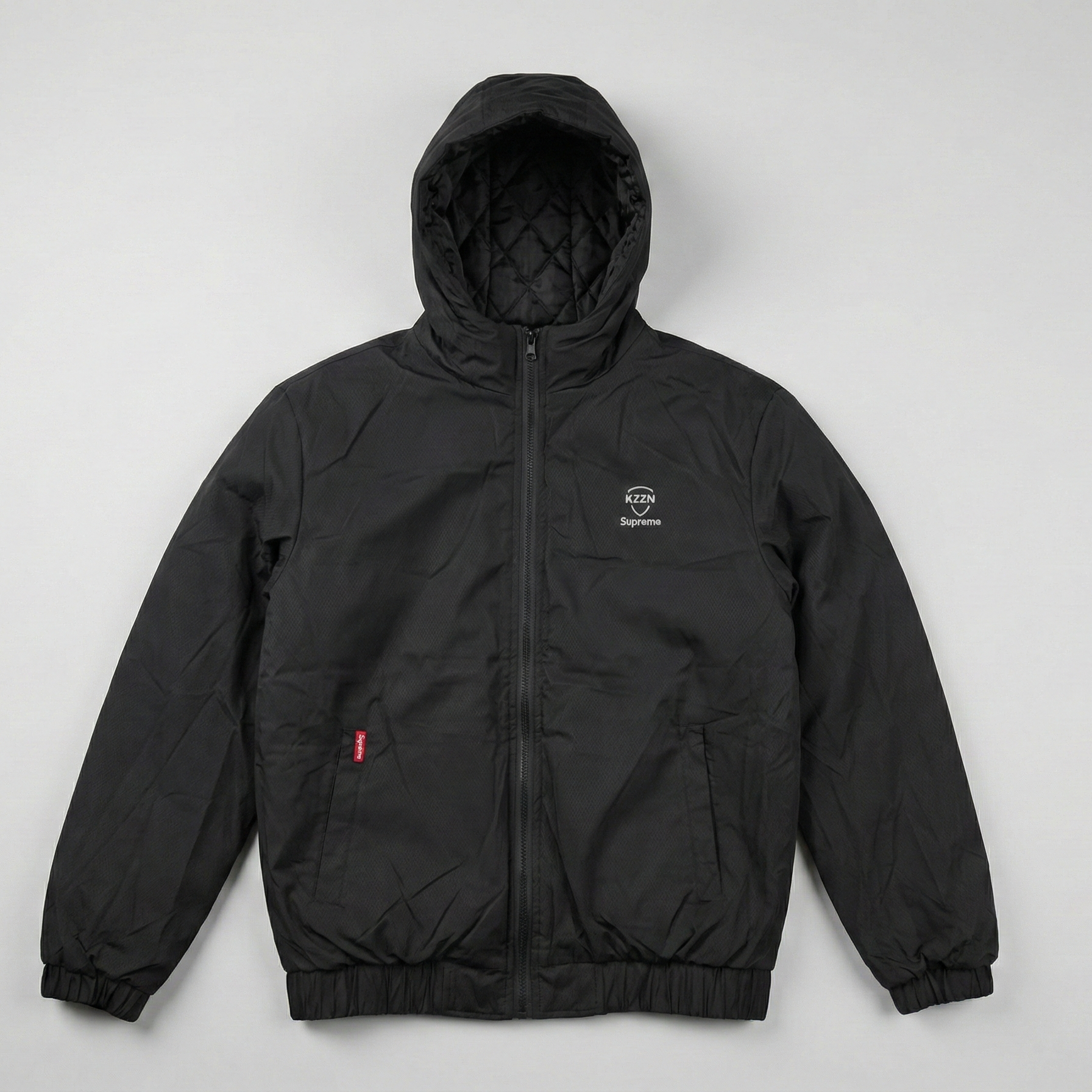 Black hooded jacket with a brand logo on a light gray background