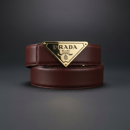Brown leather belt with gold Prada buckle on a dark gray background