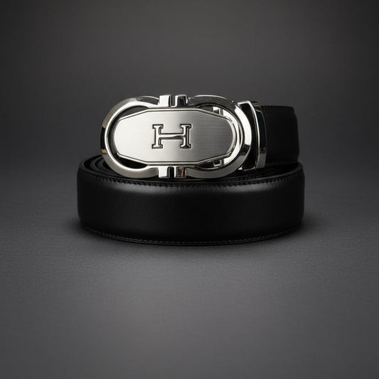 Black leather belt with a silver buckle on a dark gray background