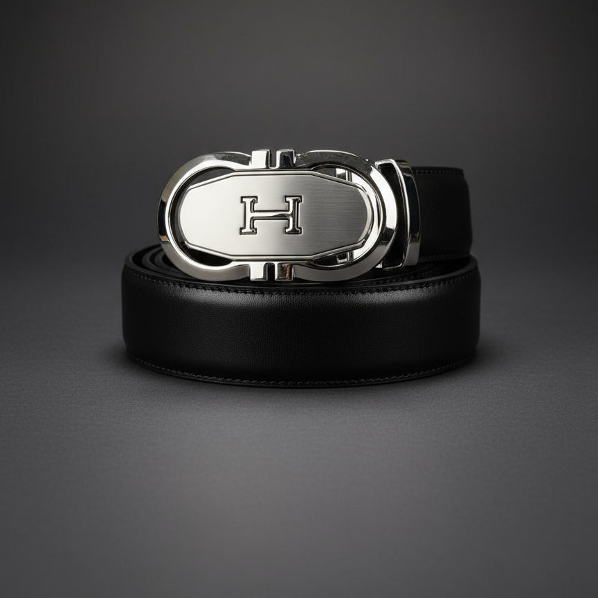Black leather belt with a silver buckle on a dark gray background
