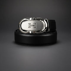 Black leather belt with a silver buckle on a dark gray background