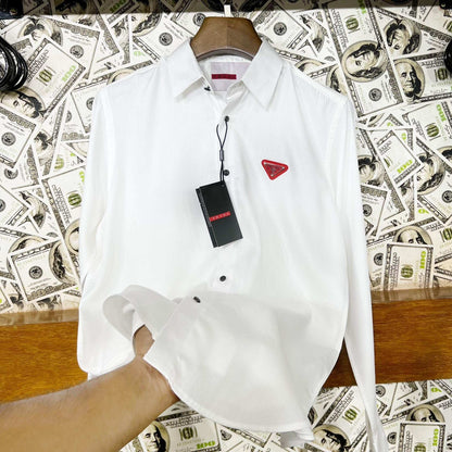 White shirt with a red logo tag on a money-themed background
