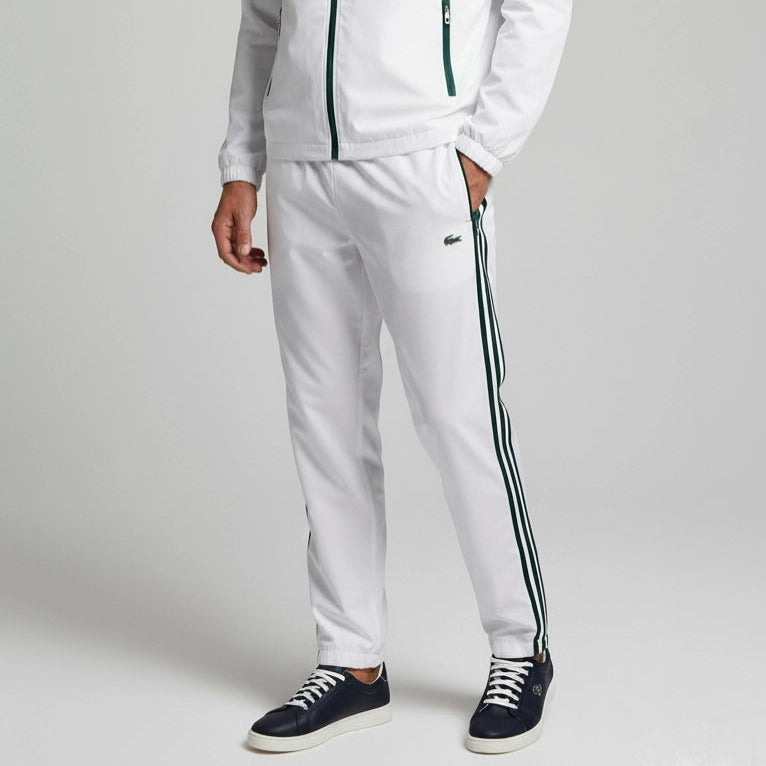 White tracksuit with black stripes on a plain background Main image