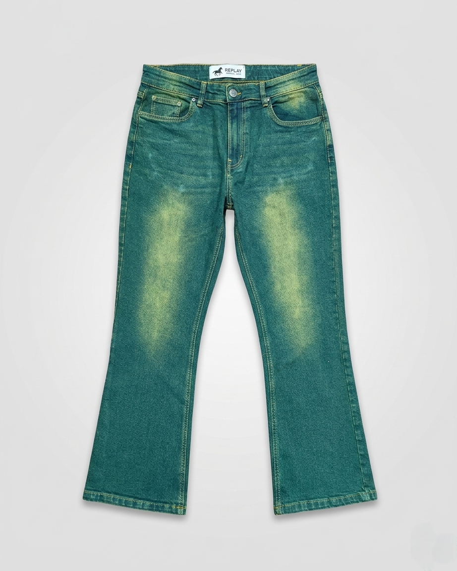 Green denim jeans on a light gray background Main image