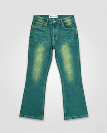 Green denim jeans on a light gray background