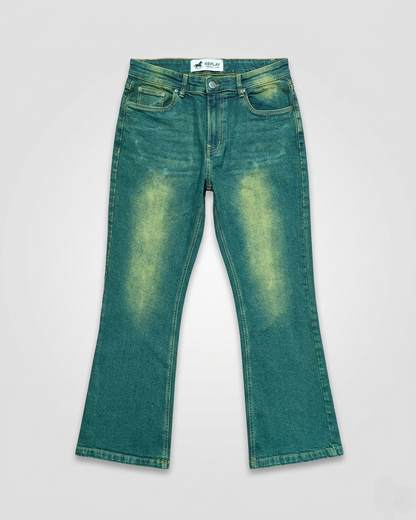 Green denim jeans on a light gray background