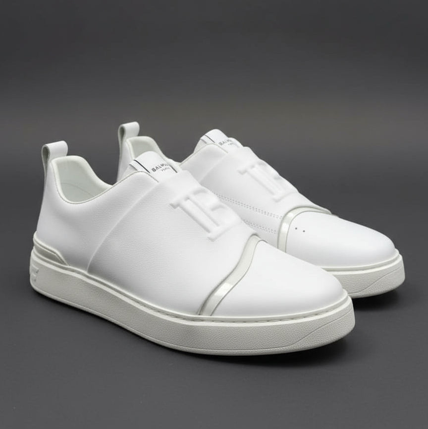 White sneakers on a dark gray background