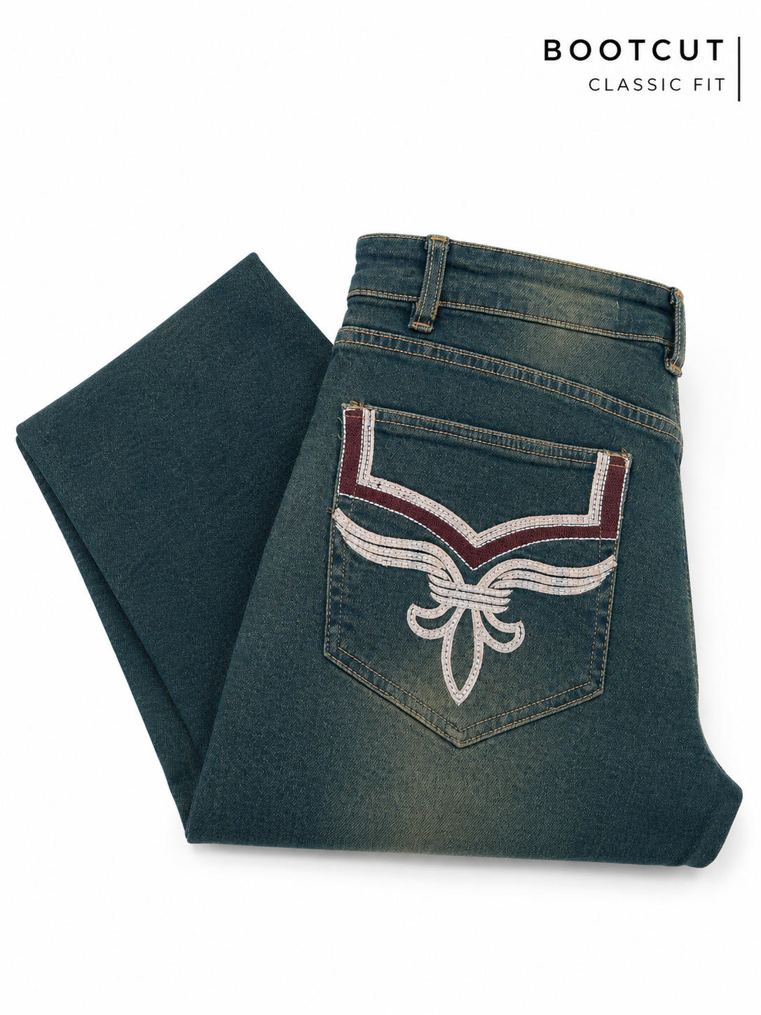 Pair of blue jeans with a decorative pocket on a white background, labeled 'Bootcut Classic Fit'.