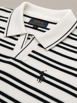 Close-up of a Polo Ralph Lauren knit polo shirt with horizontal navy and white stripes, featuring a white collar with black trim and the embroidered polo pony logo.