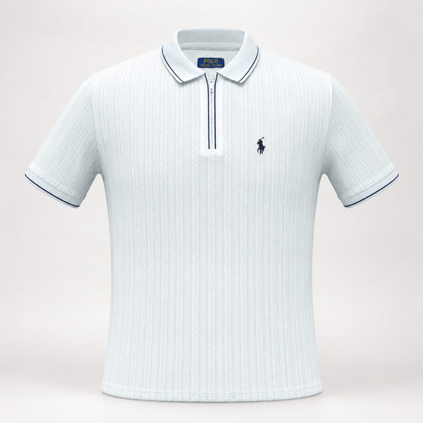 A light blue ribbed short-sleeve polo shirt with a half-zip collar, featuring a small navy embroidered Polo pony logo on the left chest and matching navy piping details.